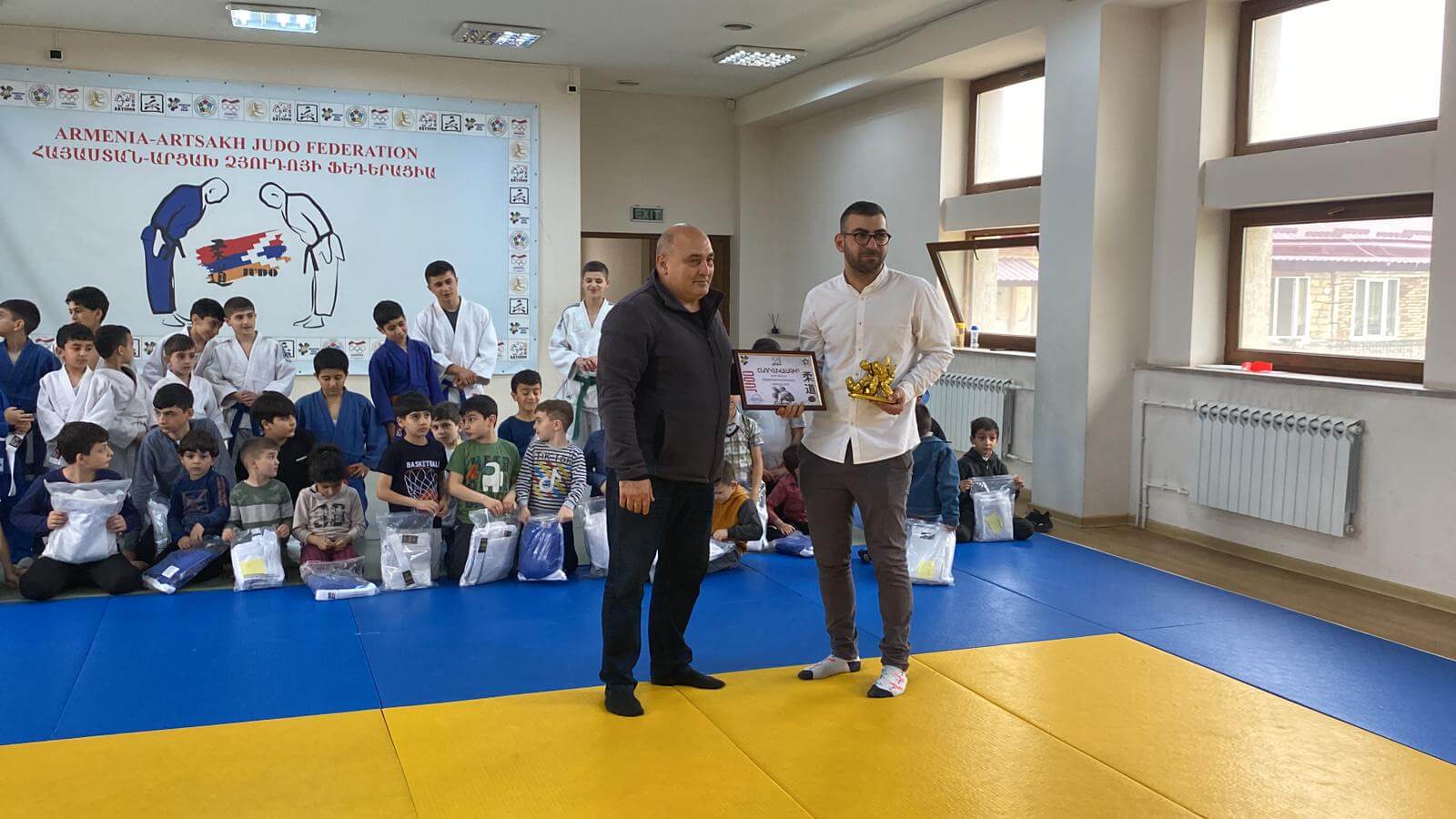 Hagop Ipdjian with participants at a community sports programme in Artsakh